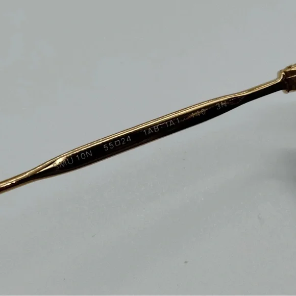 Miu Miu  Black and Gold Sunglasses - Picture 7 of 8